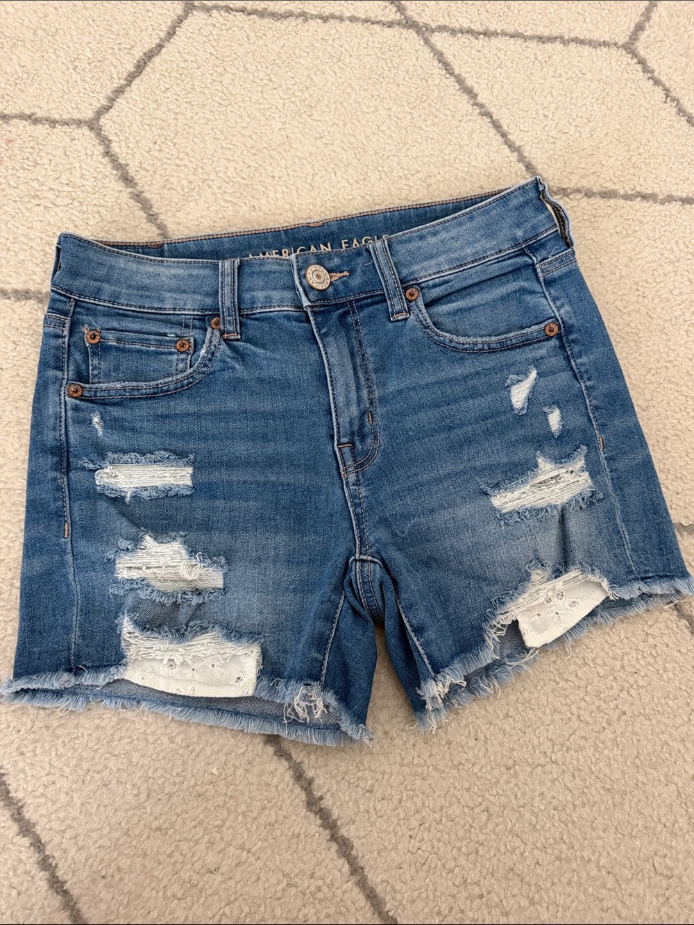American Eagle Next Level Stretch Midi Blue Distressed Denim Shorts